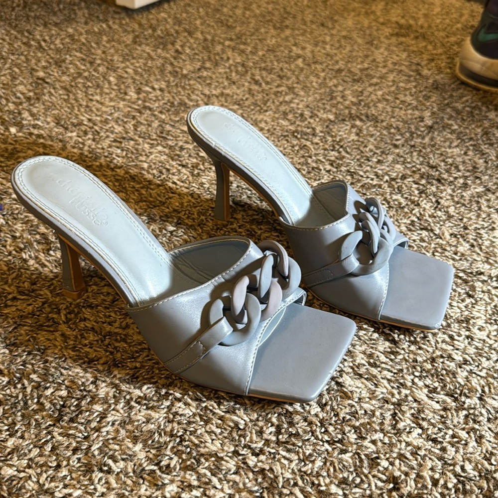 Never worn blue heels